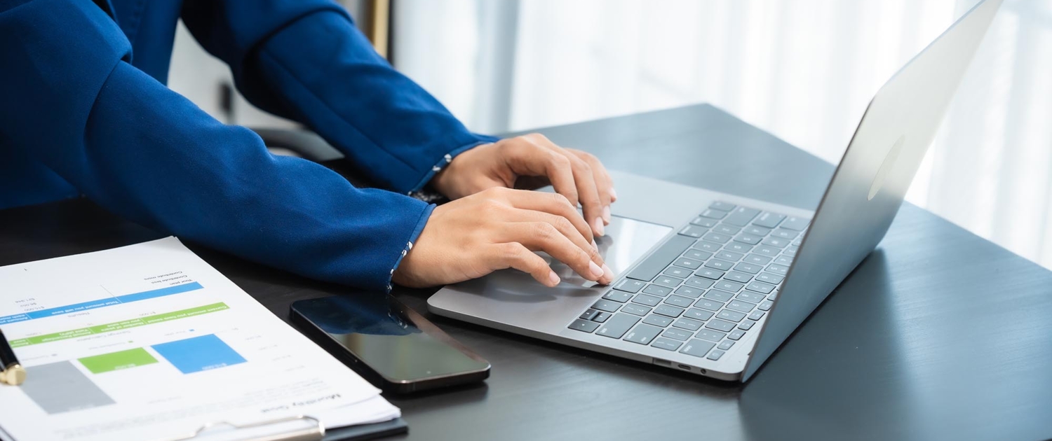 Analyst working on a laptop