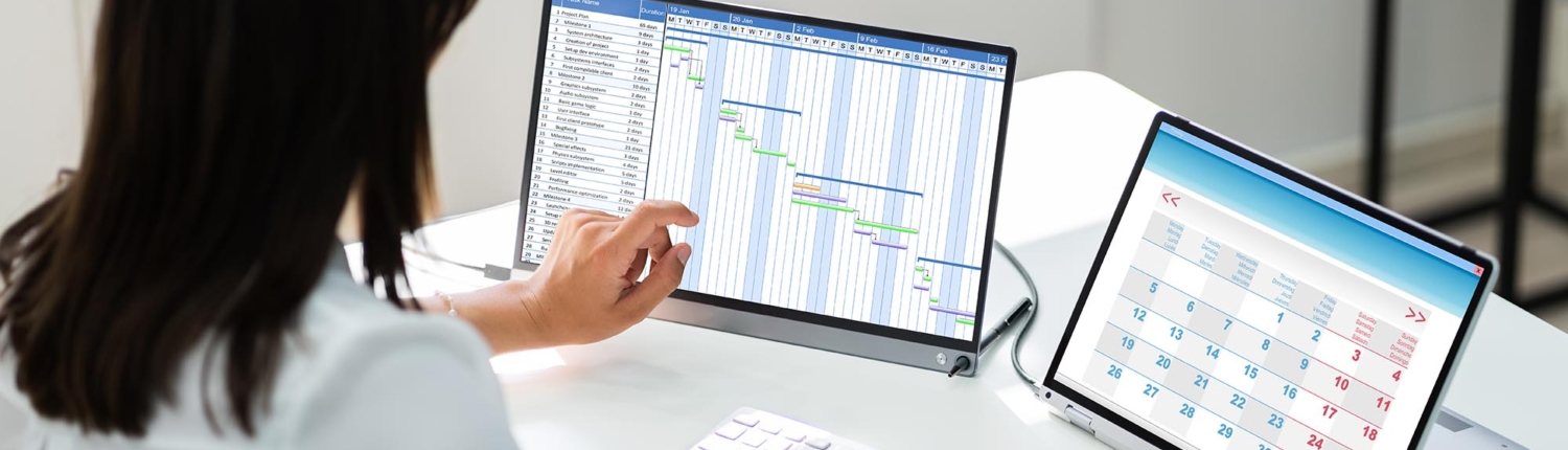Worker looking at schedules
