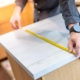 Worker measuring counter top