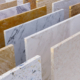 Rows of many marble countertop slabs